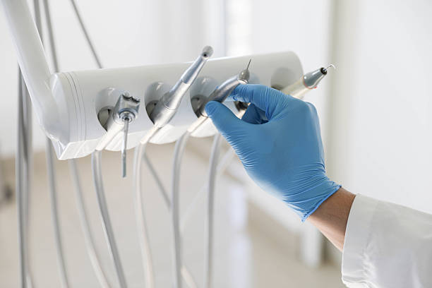 Professional Tooth Extraction technician working in Addis, LA